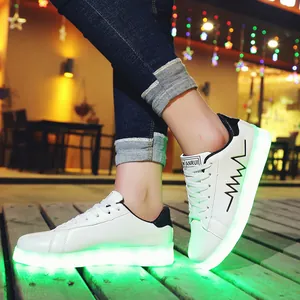 LED light up shoes for men and women with USB charging and green glowing soles