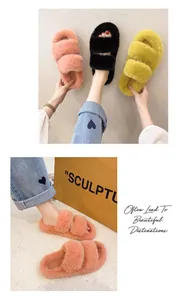 Detailed view of cozy faux fur double strap slippers in pink, black and yellow colors