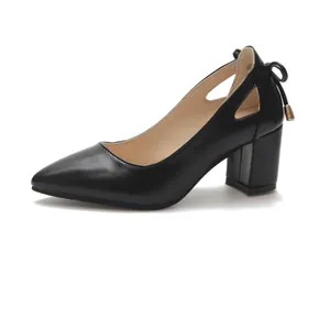 Elegant black pointed toe pumps featuring a stylish block heel and delicate bow detail at the back