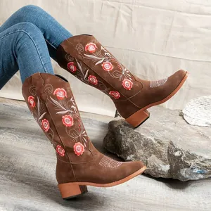 Fashionable brown knee-high cowboy boots with floral embroidery and stable thick heels