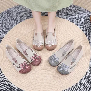 Detailed view of women's embroidered loafers in various colors with comfortable soft soles