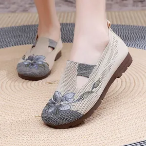 Elegant beige knit loafers with floral embroidery and soft brown sole for women