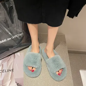 Detailed view of light blue fuzzy open-toe slippers with thick soles for women fashion