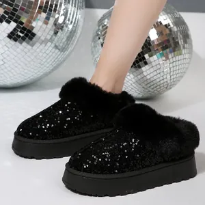 Elegantes botas de nieve con plataforma de lentejuelas negras y piel sintética