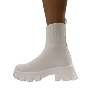 Women's white fly-knit sock boots with chunky platform sole and easy slip-on design