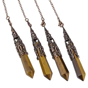 Detailed view of four Tiger's Eye hexagonal crystal pendulum pendants with copper chains.