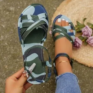 Detail view of women's trendy camouflage flat sandals with elastic back strap for summer