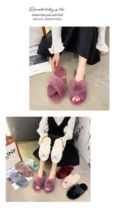 Close-up view of soft faux fur cross-strap slippers showing multiple available colors