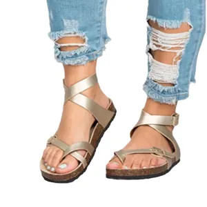 Stylish gold Roman sandals with toe-ring straps and comfortable thick cork sole