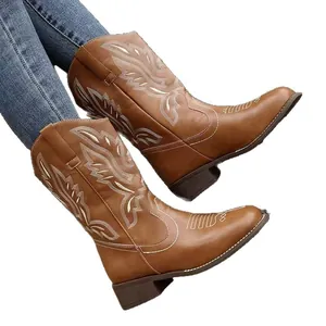 Stylish brown western cowboy boots for women with white ethnic embroidery and chunky heel