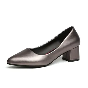 Elegant metallic silver pointed-toe pumps with stable block heel for professional women.