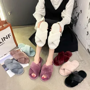 Comfortable women's criss-cross fluffy slippers for indoor home wear in multiple colors