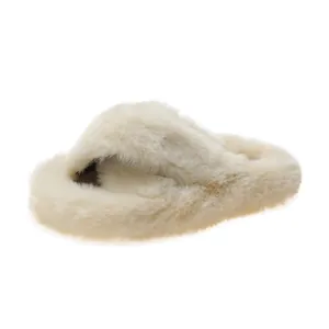 Close-up view of soft cream faux fur cross strap slippers with comfortable thick sole
