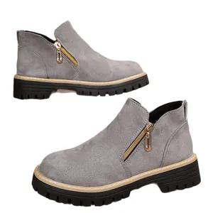 Women's stylish grey suede ankle boots featuring round toe and side zipper details