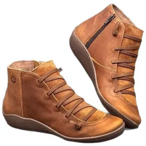 Classic vintage brown women's ankle boots with side zipper and comfortable flat sole design