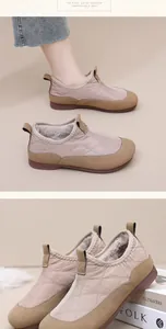 Close-up view of quilted warm winter cotton shoes with soft faux fur lining and stitching
