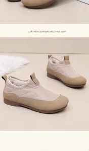 Warm beige women's winter boots with fleece lining and leather patchwork detailing.