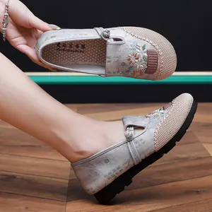 Side view of Chinese ethnic style embroidered cloth shoes with floral patterns and soft soles