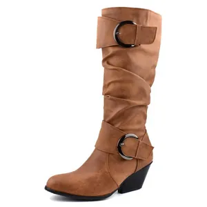 Side detail of brown faux leather knee-high boots featuring chic buckle straps and chunky heel
