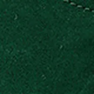 Macro detail of dark green suede material with fine stitching for warm winter boots