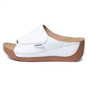 Fashionable white women's wedge sandals with chunky platform sole and open toe design