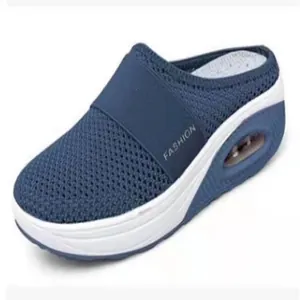 Detailed view of women's blue mesh platform mule with thick air-cushion sole.