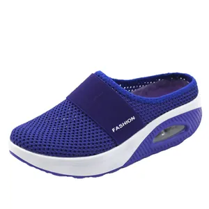 Ademende blauwe mesh mules voor dames met een dikke platformzool met luchtkussen
