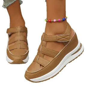 Comfortable women's brown platform wedge sandals featuring hollow-out design and velcro straps