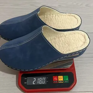 Lightweight blue wedge mule slippers with faux fur lining for women weight display 218g