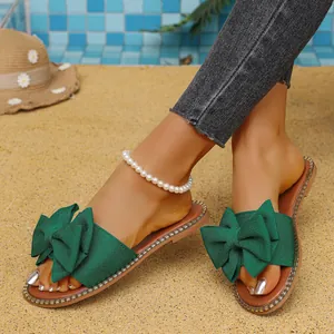 Elegant women's dark green bow flat slides with sparkling rhinestone edges for beach