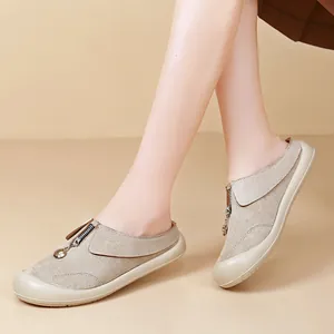 Comfortable beige thick-soled women's casual mules with front zipper detail