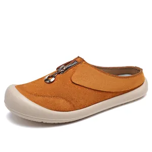 Stylish women's brown suede platform mules with decorative zipper for spring casual wear