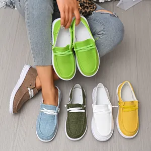 Detailed view of women's casual canvas loafers shown in multiple vibrant colors