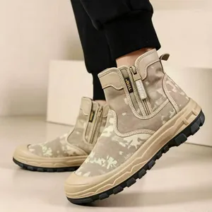 Detail view of camouflage tactical boots with side zipper and rugged rubber sole