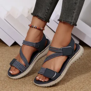Comfortable navy blue women's sandals with elastic straps and adjustable Velcro straps