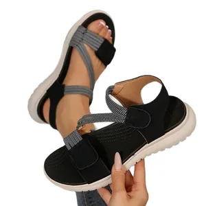Comfortable women's wedge sandals with elastic cross straps and Velcro closure