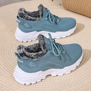 Blauwe wintersneakers met warme grijze voering van imitatiebont en gebreid bovenwerk