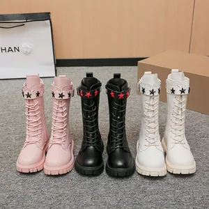 Three pairs of stylish girls' mid-calf Martin boots in pink, black, and off-white colors.