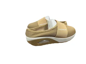 High-angle side view of beige wedge mesh mules with air cushion sole and strap