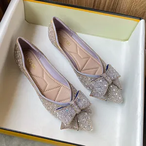Elegant lavender pointed-toe flat shoes with sparkling rhinestone bow and soft sole