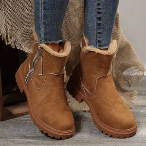 Brown winter snow boots for women with plush lining and side zipper details