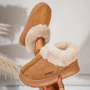 Close-up of cozy brown plush-lined platform slippers with fur trim and 'SPORT' detail