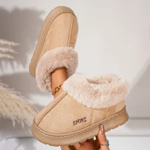Detail of beige fleece-lined winter slippers with platform and SPORT embroidery