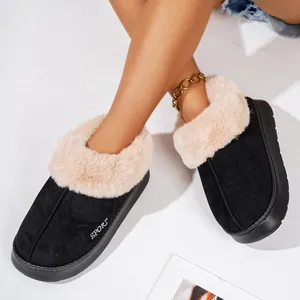 Close-up of warm winter slippers for women with soft faux fur lining and anti-slip sole