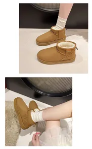 Warm camel suede winter snow boots with white fleece lining, stylish flat short boots.
