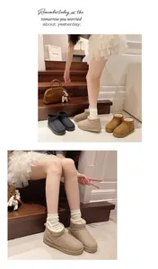 Detail of beige fur-lined short snow boots worn with white socks and a tulle skirt