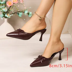 Elegant burgundy pointed-toe mules with a decorative bow and 8cm slim high heels