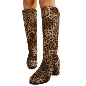 Chic leopard print knee-high fashion boots with suede texture and chunky high heels