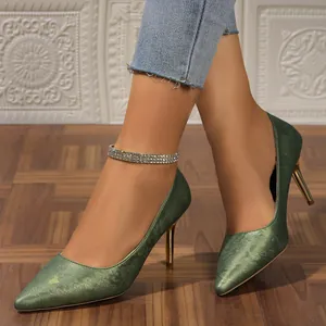 Elegant green floral pointed toe stiletto pumps featuring sleek gold heels for women