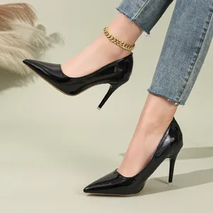 Elegant black patent leather pointed-toe stiletto pumps for women's fashion wear.